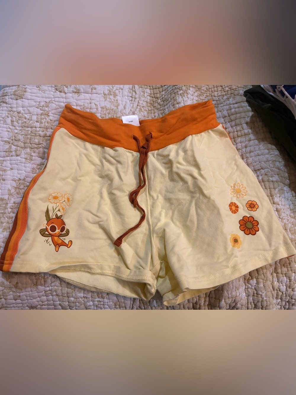 Disney Cream Shorts with Orange Waistband & Floral Print